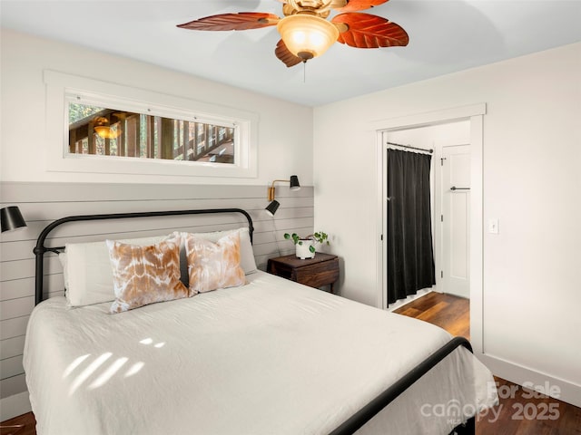 bedroom featuring hardwood / wood-style floors and ceiling fan