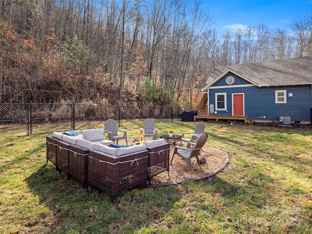 view of yard featuring an outbuilding, central air condition unit, and an outdoor hangout area