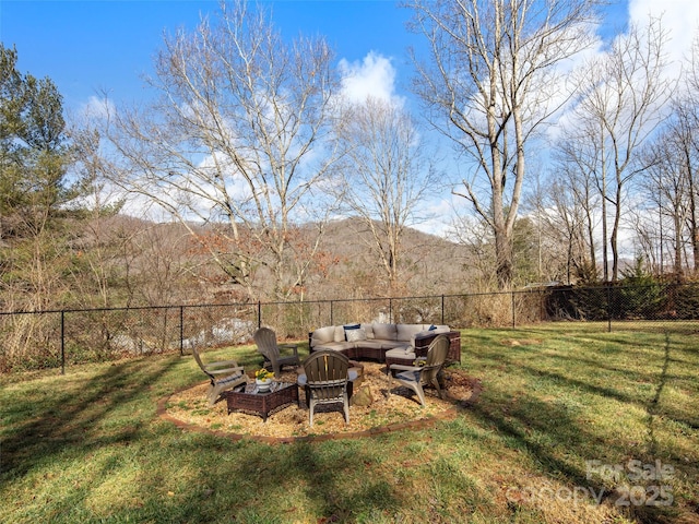 view of yard with a mountain view and an outdoor hangout area