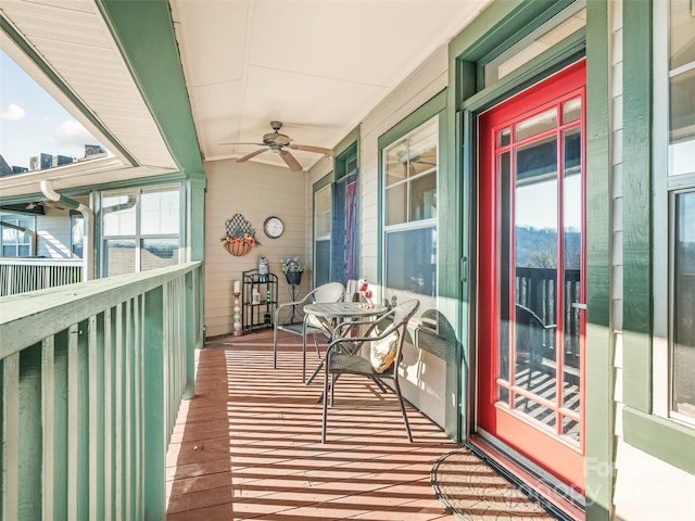 balcony featuring ceiling fan