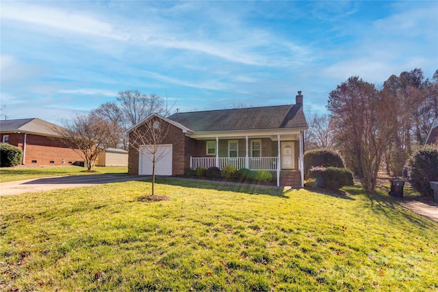 ranch-style house with covered porch, a garage, and a front lawn