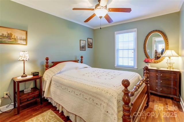 bedroom with ceiling fan, wood-type flooring, and ornamental molding