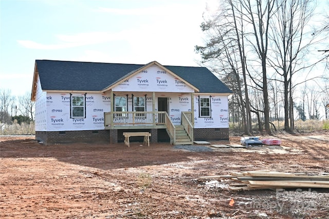 property in mid-construction with a porch