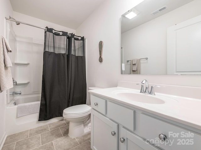 bathroom with toilet, shower / tub combo, vanity, visible vents, and tile patterned floors