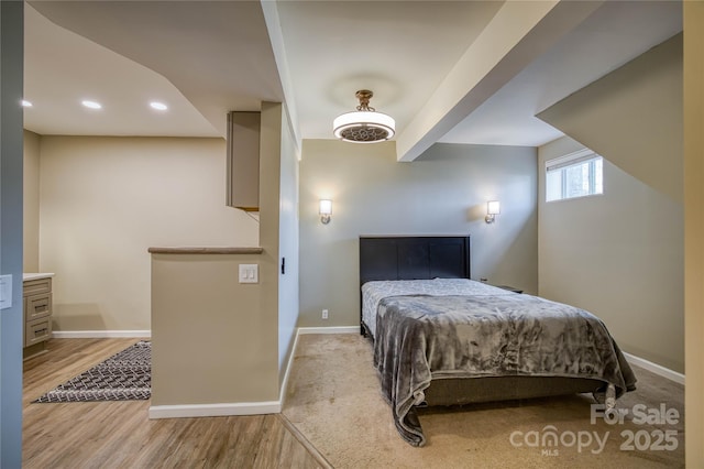 bedroom featuring light hardwood / wood-style floors