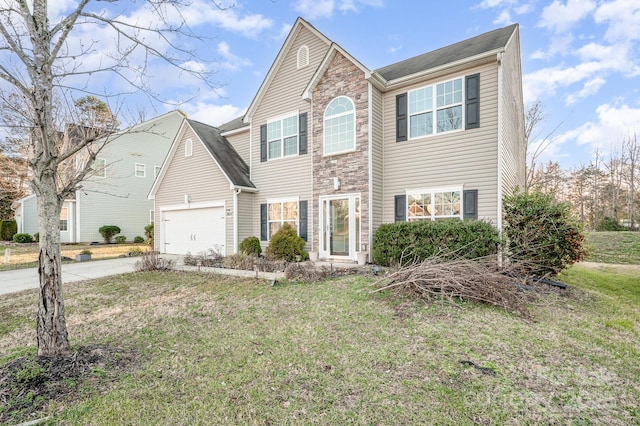 traditional home with a garage, a front yard, stone siding, and concrete driveway