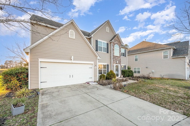 traditional home with driveway and a garage