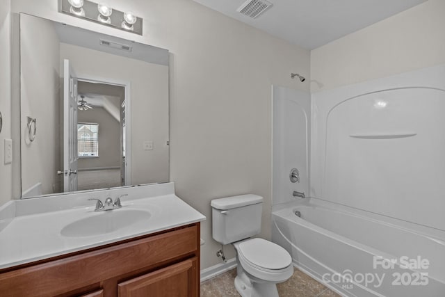 bathroom featuring baseboards, visible vents, toilet, vanity, and washtub / shower combination