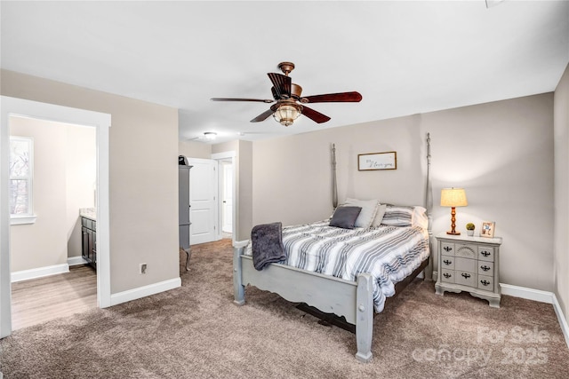 bedroom with a ceiling fan, carpet flooring, and baseboards