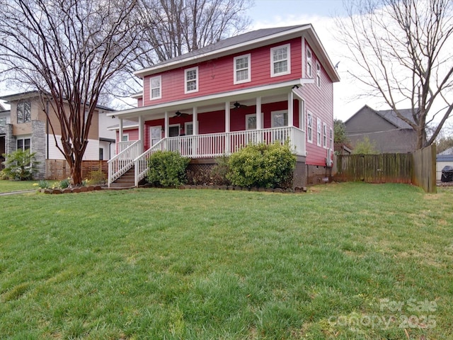 view of front facade with covered porch, crawl space, ceiling fan, fence, and a front lawn