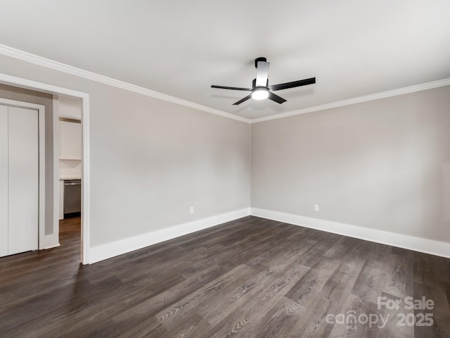 unfurnished room featuring baseboards, dark wood-type flooring, a ceiling fan, and crown molding