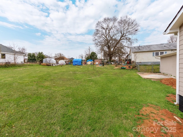 view of yard with fence