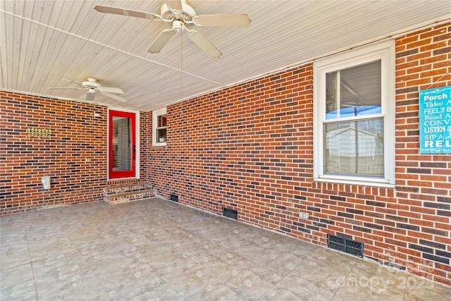 view of patio / terrace with ceiling fan and entry steps