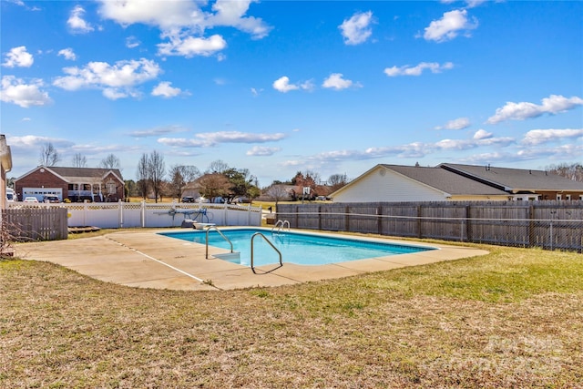 view of pool featuring a patio area, a fenced backyard, a fenced in pool, and a yard