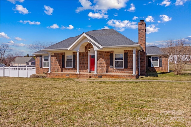 view of front of property featuring brick siding, a chimney, a front yard, crawl space, and fence