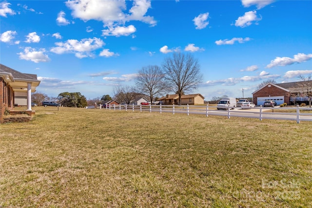 view of yard with fence