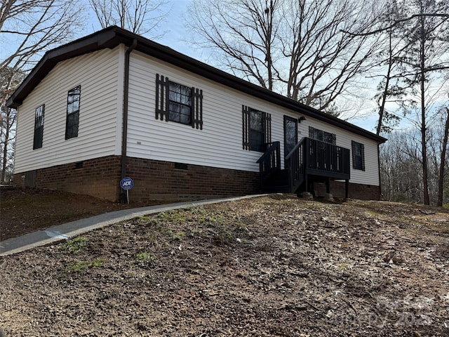 view of front of home with crawl space