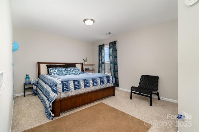 bedroom featuring carpet, visible vents, and baseboards