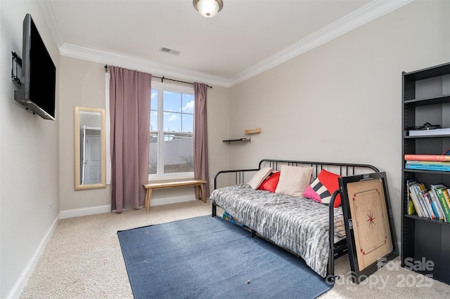 carpeted bedroom with visible vents, crown molding, and baseboards