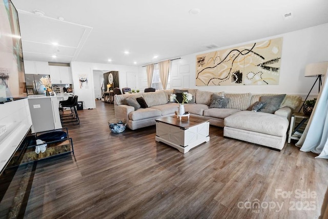 living room with hardwood / wood-style floors