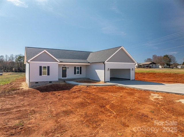 single story home featuring a garage