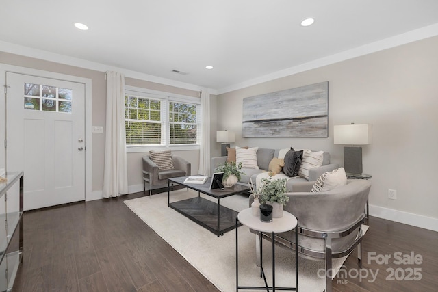 living room with recessed lighting, wood finished floors, visible vents, and baseboards