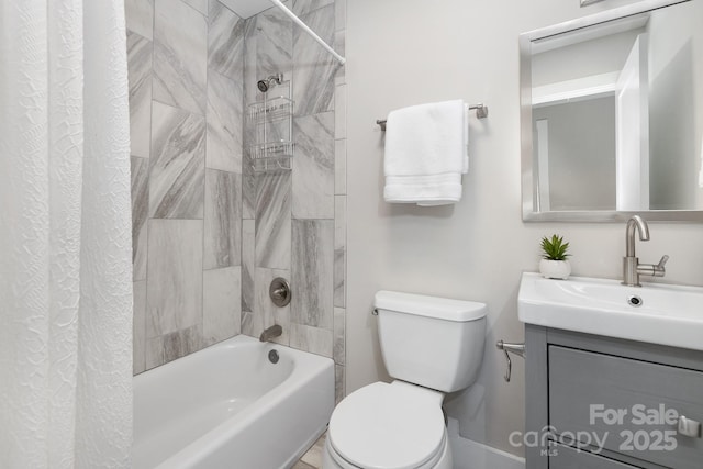 full bath featuring shower / bath combo, vanity, and toilet