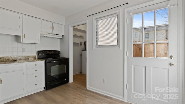 kitchen with plenty of natural light, decorative backsplash, light hardwood / wood-style floors, black electric range, and white cabinets