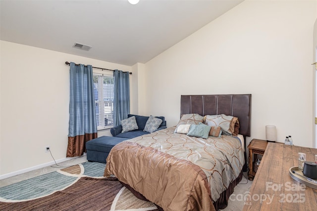 bedroom featuring light colored carpet, lofted ceiling, visible vents, and baseboards