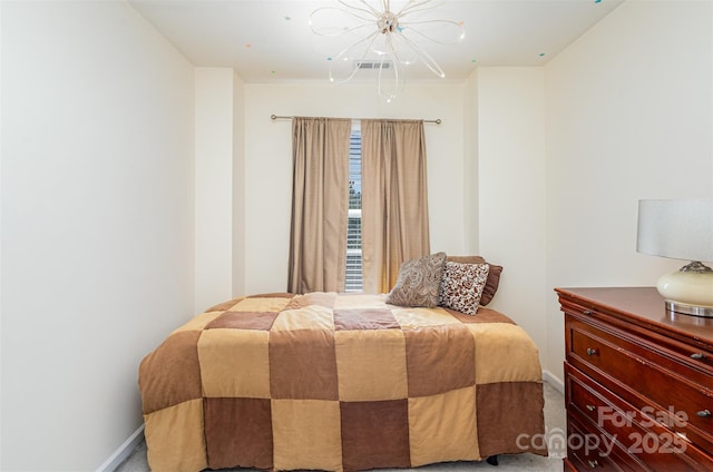 bedroom with baseboards, visible vents, a notable chandelier, and carpet flooring