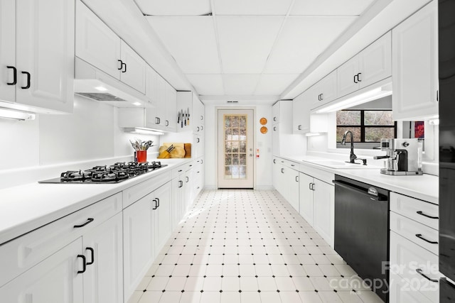 53 Hackberry Ln, Waynesville, NC 28785 - kitchen with black appliances, a paneled ceiling, white cabinets, light countertops, and under cabinet range hood