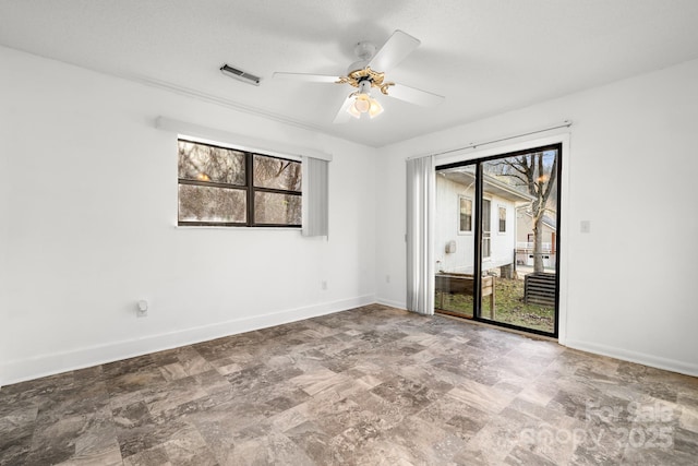 53 Hackberry Ln, Waynesville, NC 28785 - unfurnished room featuring a ceiling fan and stone finish flooring
