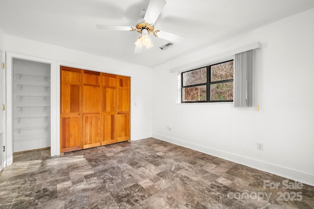 53 Hackberry Ln, Waynesville, NC 28785 - unfurnished bedroom with baseboards and ceiling fan