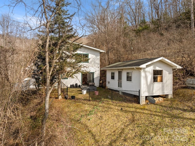 53 Hackberry Ln, Waynesville, NC 28785 - view of side of property featuring an outdoor structure and a lawn