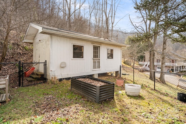 53 Hackberry Ln, Waynesville, NC 28785 - view of outbuilding with a gate