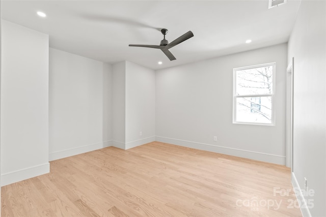 unfurnished room featuring recessed lighting, ceiling fan, baseboards, and wood finished floors