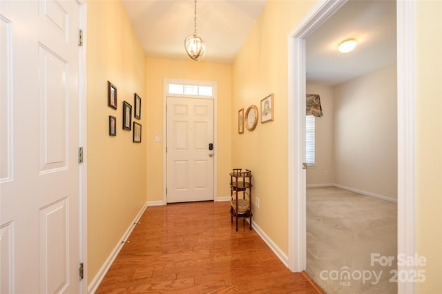 doorway to outside featuring light hardwood / wood-style flooring