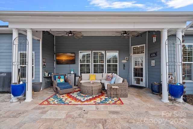 view of patio / terrace with an outdoor living space and a ceiling fan