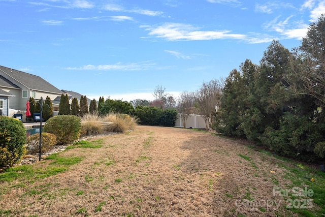 view of yard with fence