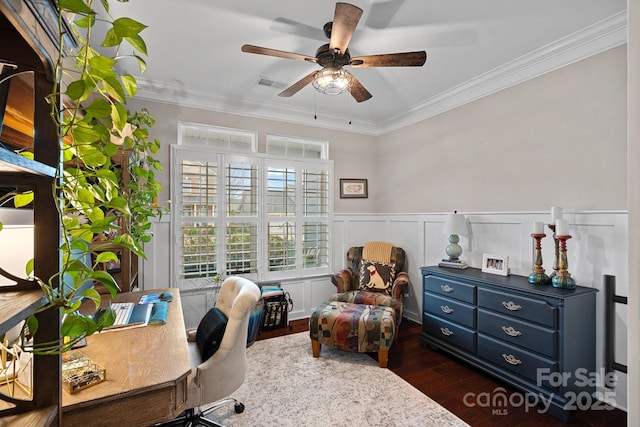 home office with dark wood finished floors, visible vents, crown molding, and ceiling fan