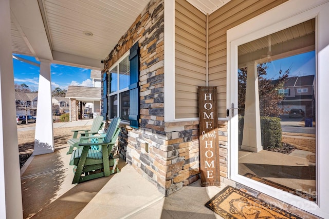 view of patio featuring a porch