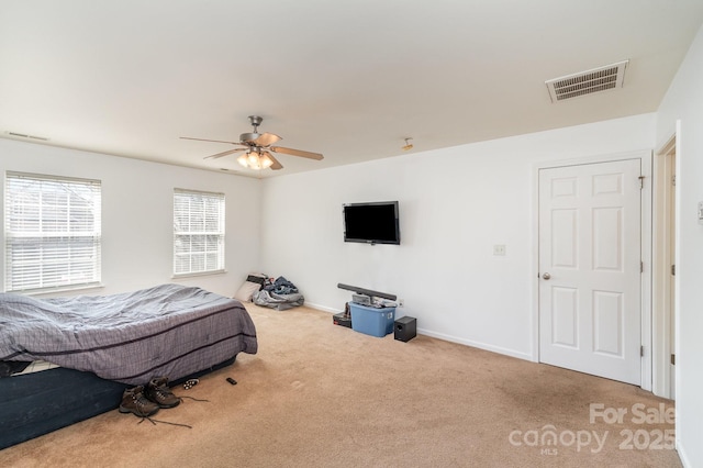 bedroom featuring visible vents, ceiling fan, baseboards, and carpet