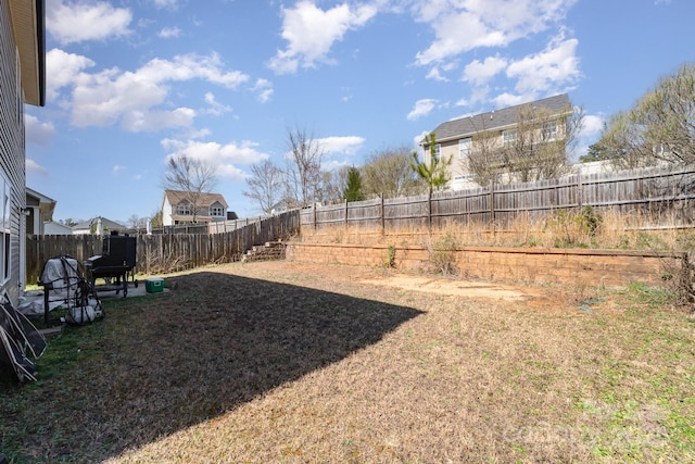 view of yard featuring a fenced backyard