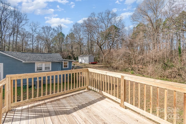 wooden deck featuring an outdoor structure