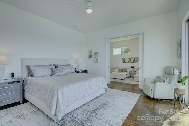 bedroom featuring dark wood-style floors and a ceiling fan