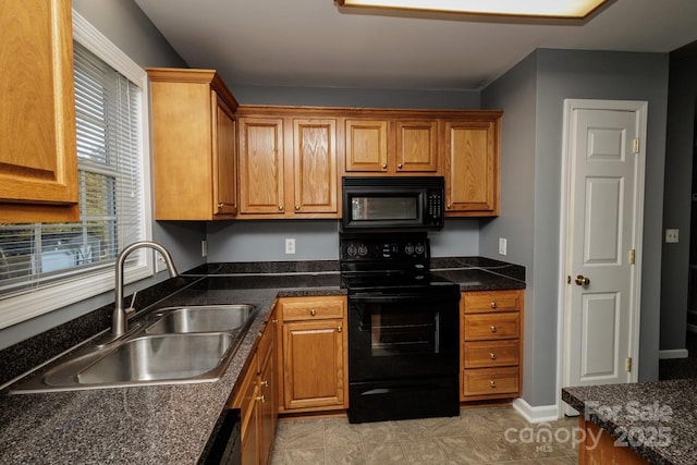 kitchen featuring sink and black appliances