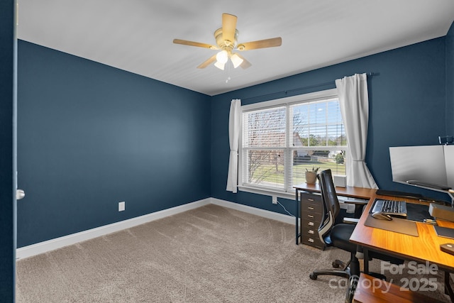 office area with baseboards, carpet floors, and a ceiling fan