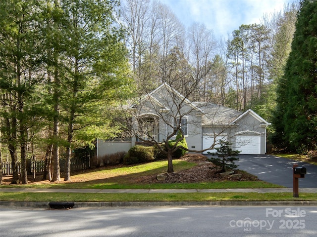 view of front of property featuring a garage