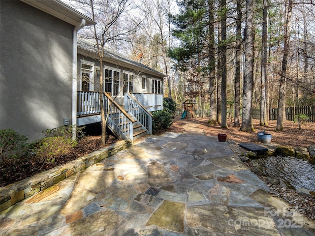 view of patio / terrace featuring a playground