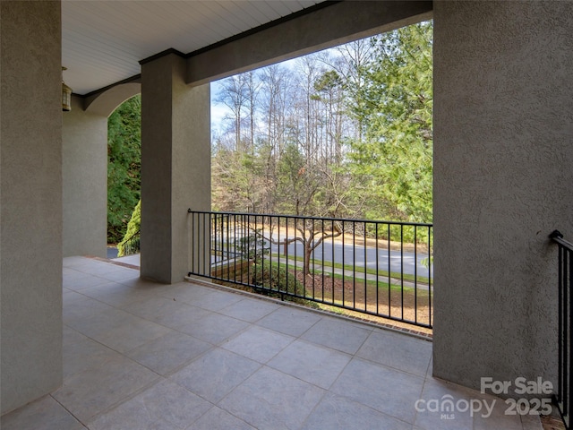 view of patio / terrace with a balcony